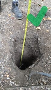 Hole auger-drilled at least 50cm below base of luminaire